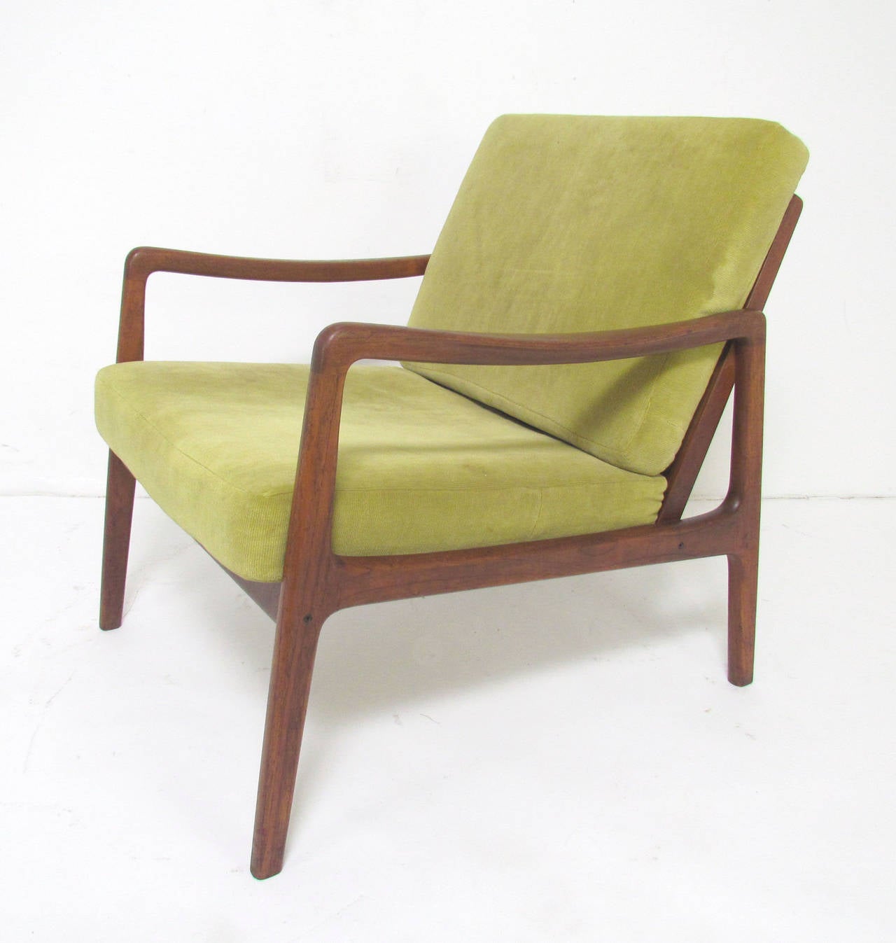 Danish lounge armchair in teak designed by Ole Wanscher and made by France & Son, circa late 1950s-early 1960s.