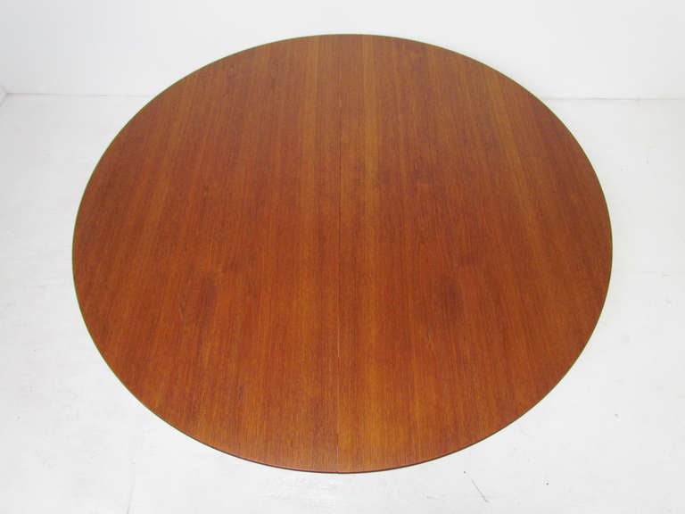 Teak dining table designed by Ib Kofod-Larsen for Christensen & Larsen, Denmark, in 1955.   Generously proportioned at 55