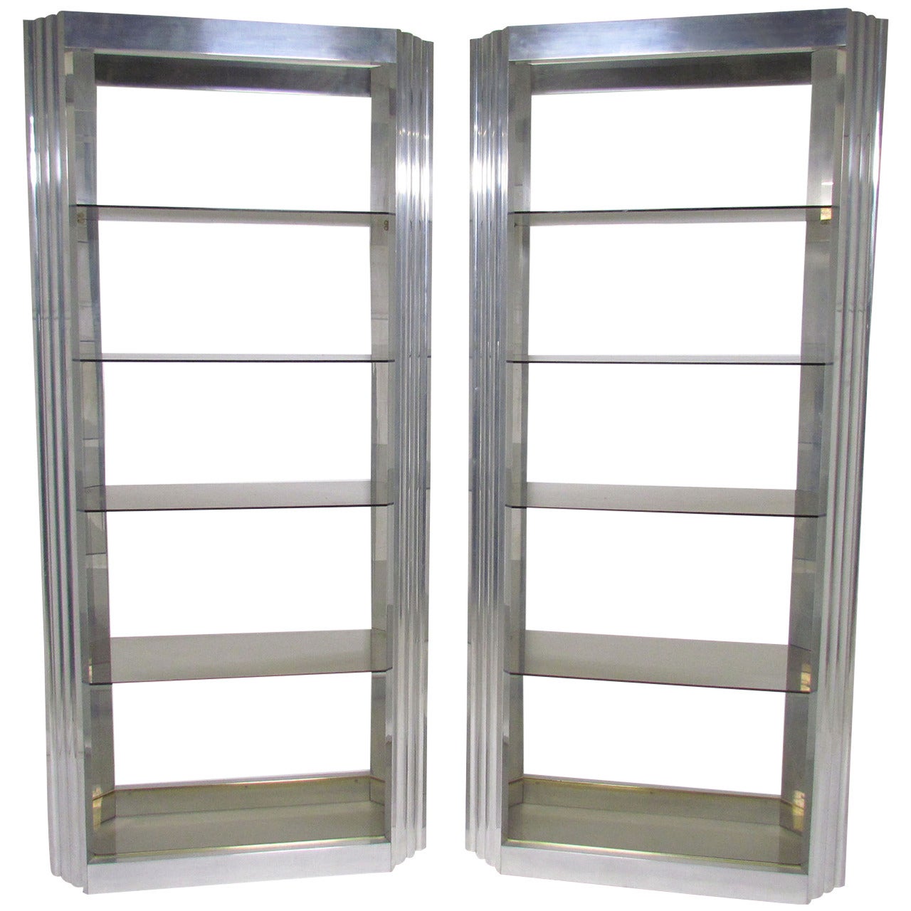 Pair of Deco Style Skyscraper Etageres in Polished Aluminum