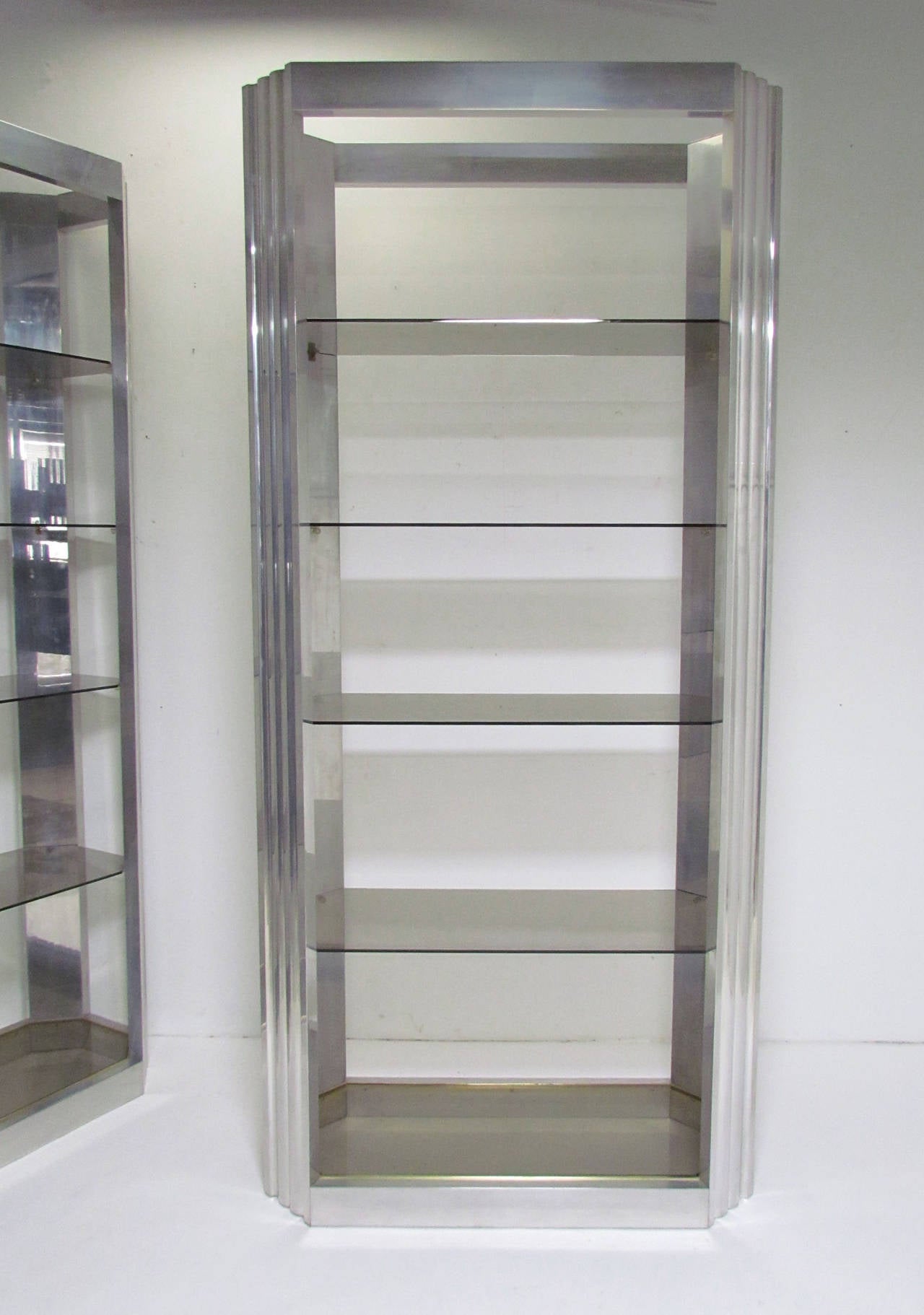 Pair of Deco Style Skyscraper Etageres in Polished Aluminum