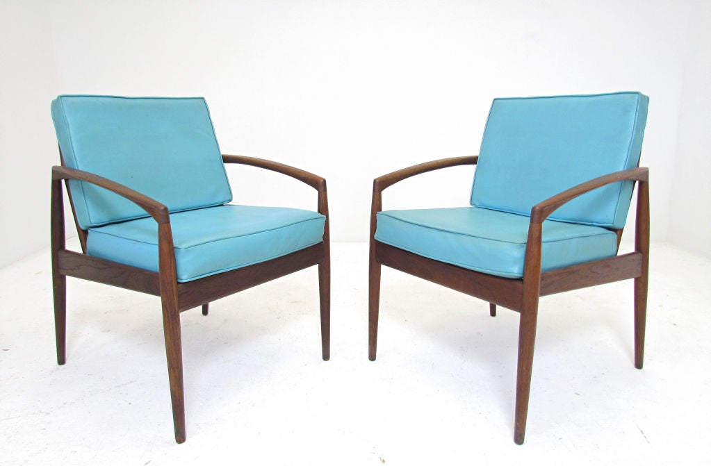 Pair if Danish teak lounge chairs with carved sculptural arms by Kai Kristiansen for Magnus Olesen, ca. 1950s.