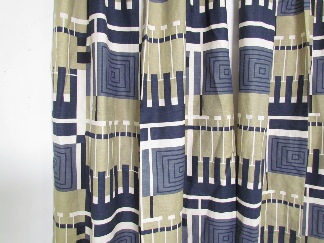 Nine panels of vintage drapes by Frank Lloyd Wright, Design No. 102 from his acclaimed textile "Taliesen Line" produced by F. Schumacher and Co., 1955.

Divided in photos into three pairs, and one set of three panels as follows:

One