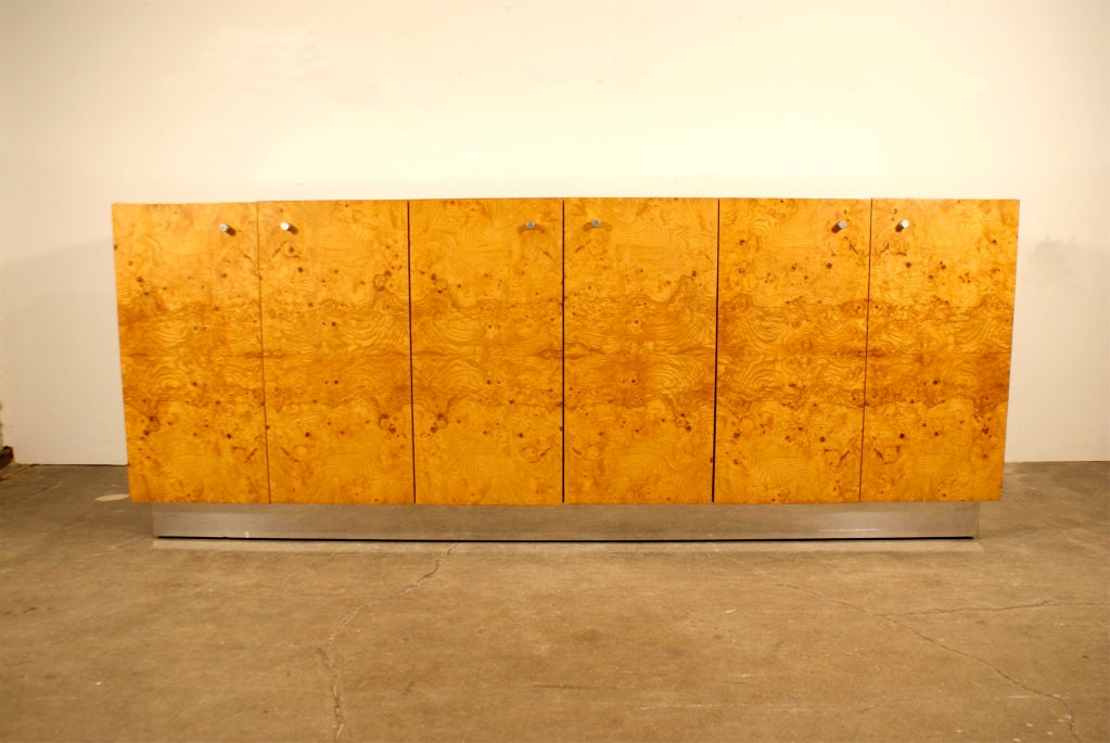 Burl wood credenza / sideboard / cabinet on chrome plinth by Milo Baughman for Thayer Coggin.