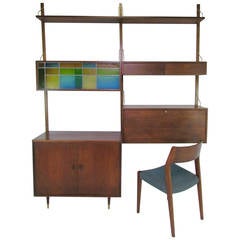 Danish Teak Wall-Mounted Shelving Unit in the Manner of Poul Cadovius (Cado)