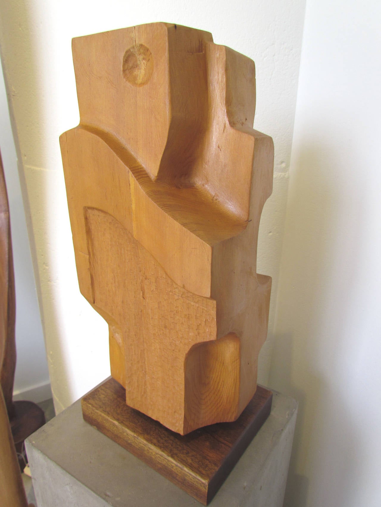 Abstract figural hand-carved wood sculpture, signed and dated 1971.
