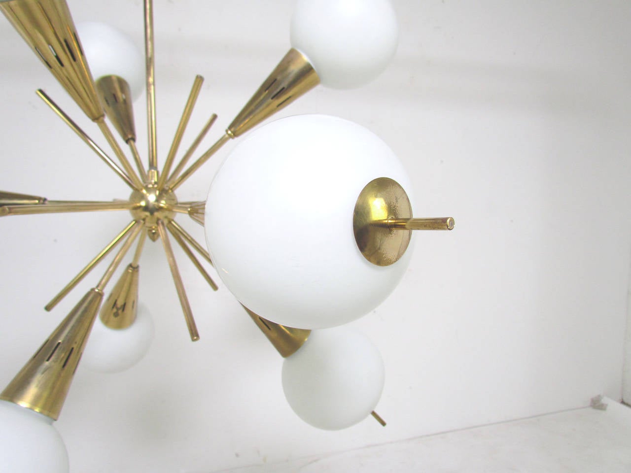 Brass and Glass Globe Nine-Arm Sputnik Chandelier Attributed to Stilnovo In Excellent Condition In Peabody, MA