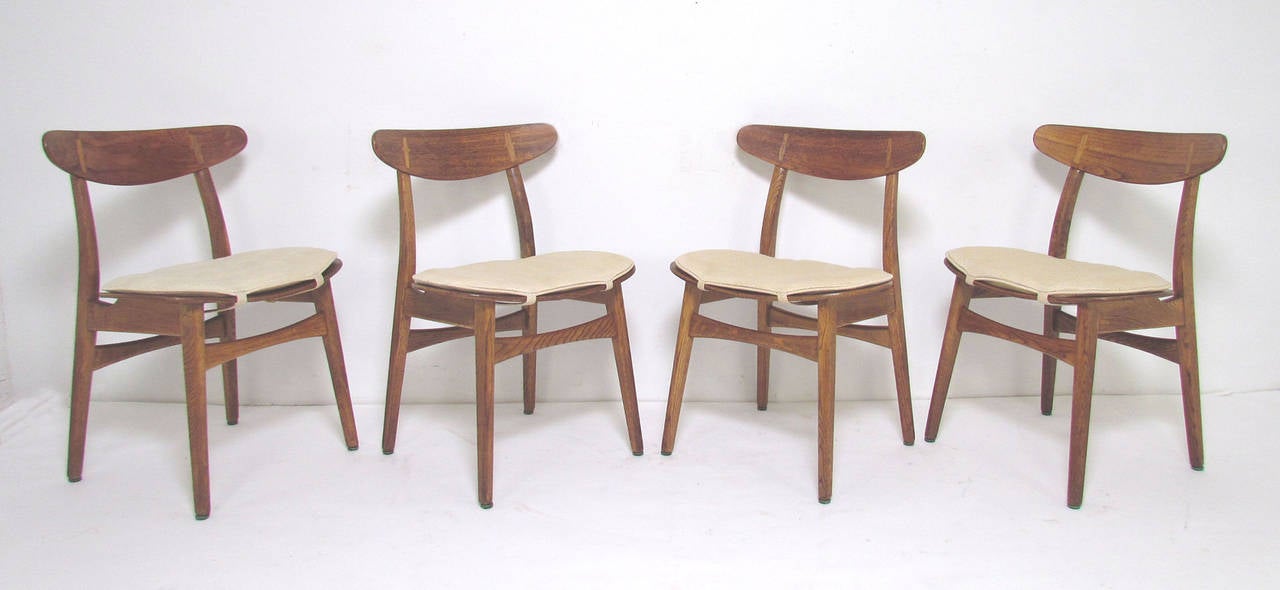 Set of Four Danish Teak and Oak Dining Chairs by Hans Wegner, circa 1960s 1