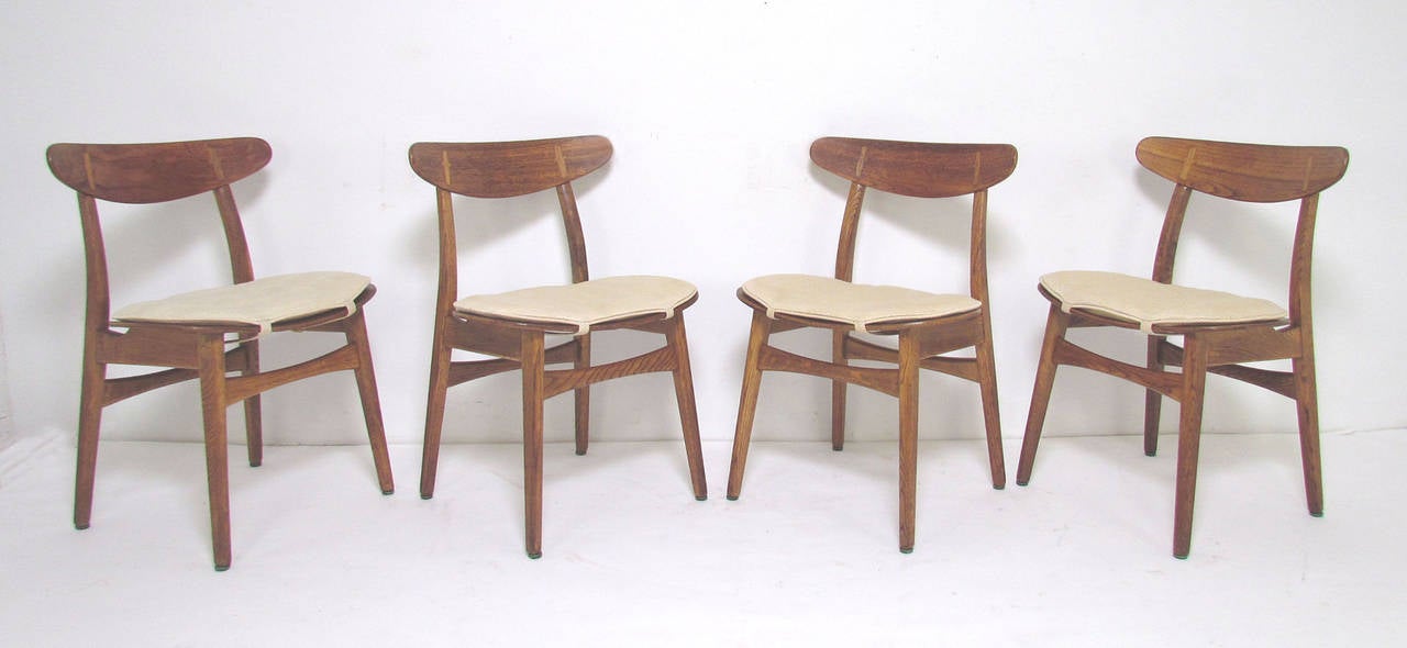 Set of Four Danish Teak and Oak Dining Chairs by Hans Wegner, circa 1960s 1