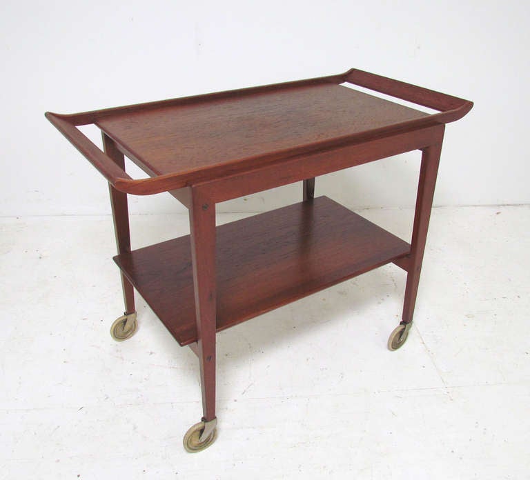 Danish teak tea trolley by Tove & Edvard Kindt-Larsen, with removable serving tray top.   Rich deep patina.