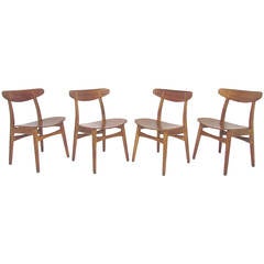 Set of Four Danish Teak and Oak Dining Chairs by Hans Wegner, circa 1960s