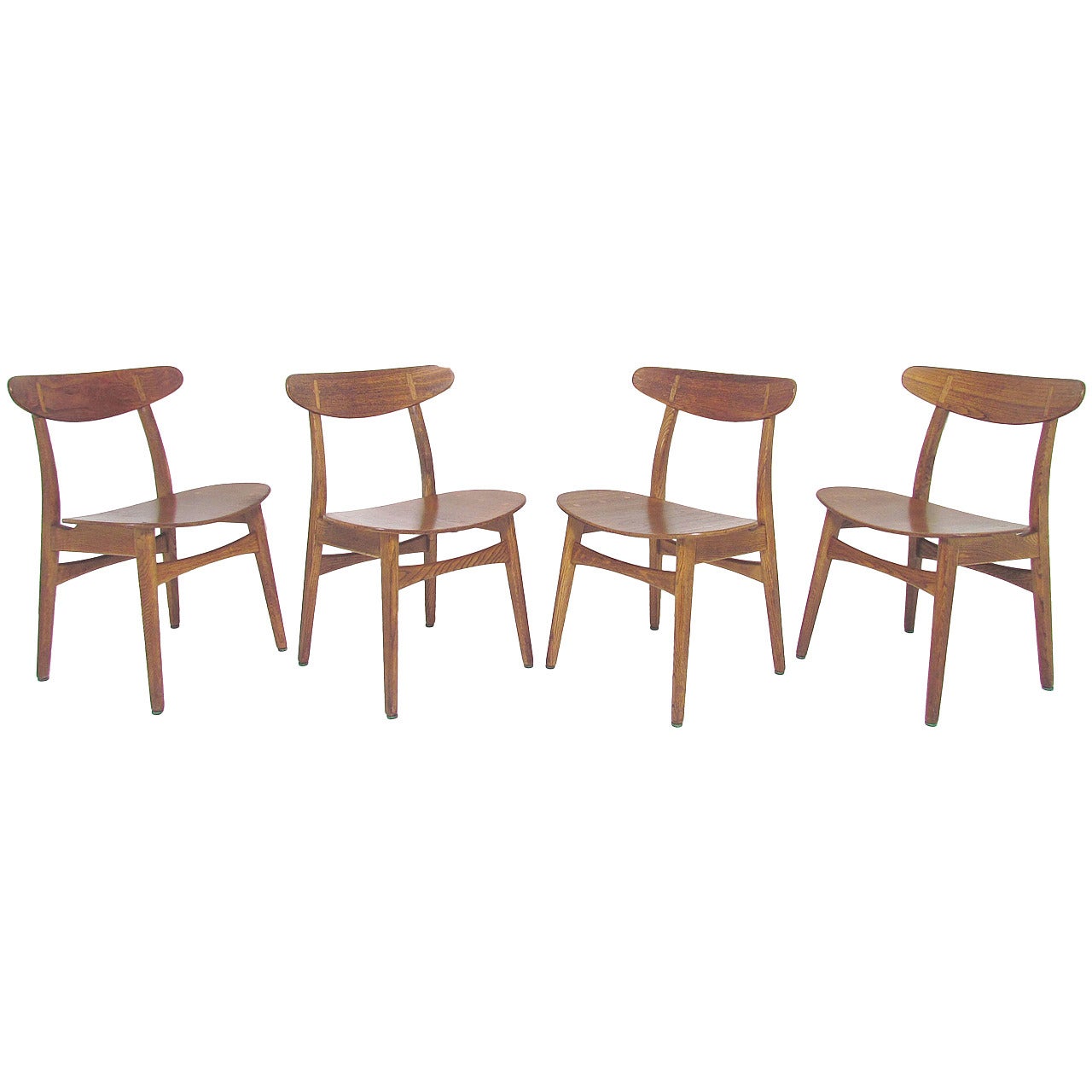 Set of Four Danish Teak and Oak Dining Chairs by Hans Wegner, circa 1960s