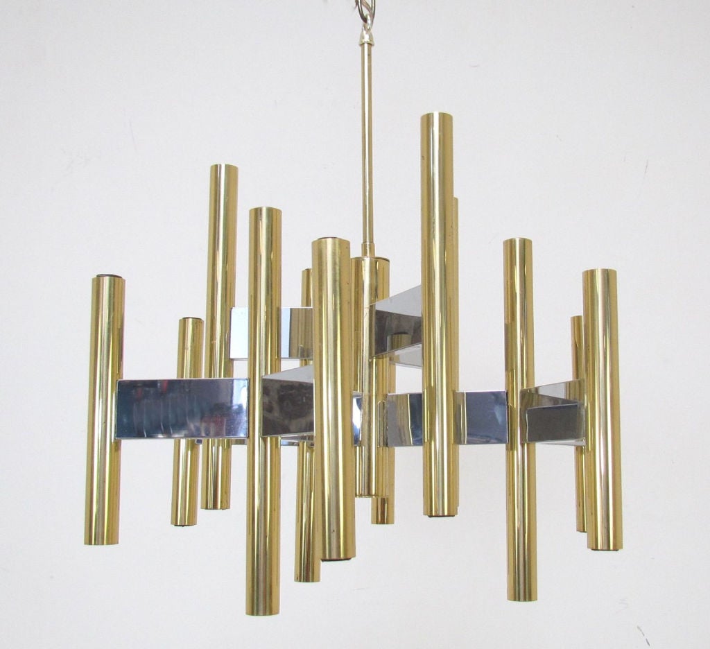 Modernist chandelier in brass and chrome by Robert Sonneman, ca. 1970s.   Features both up and down lights (pictured without bulbs).
