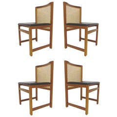 Set of Four Danish Teak and Cane Dining Chairs by Knud Andersen