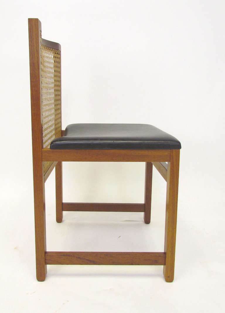 Mid-Century Modern Set of Four Danish Teak and Cane Dining Chairs by Knud Andersen