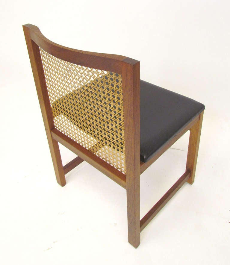 Late 20th Century Set of Four Danish Teak and Cane Dining Chairs by Knud Andersen