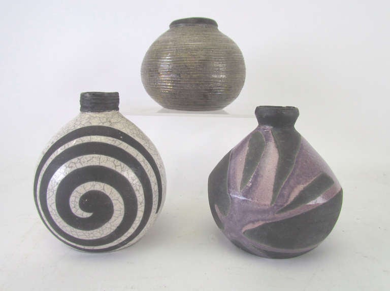 Collection of three studio pottery vases by internationally recognized ceramicist Andrew Berends.  Trained at Alfred University in the 1970s, Berends is represented by hundreds of galleries in the United States and has exhibited in many national