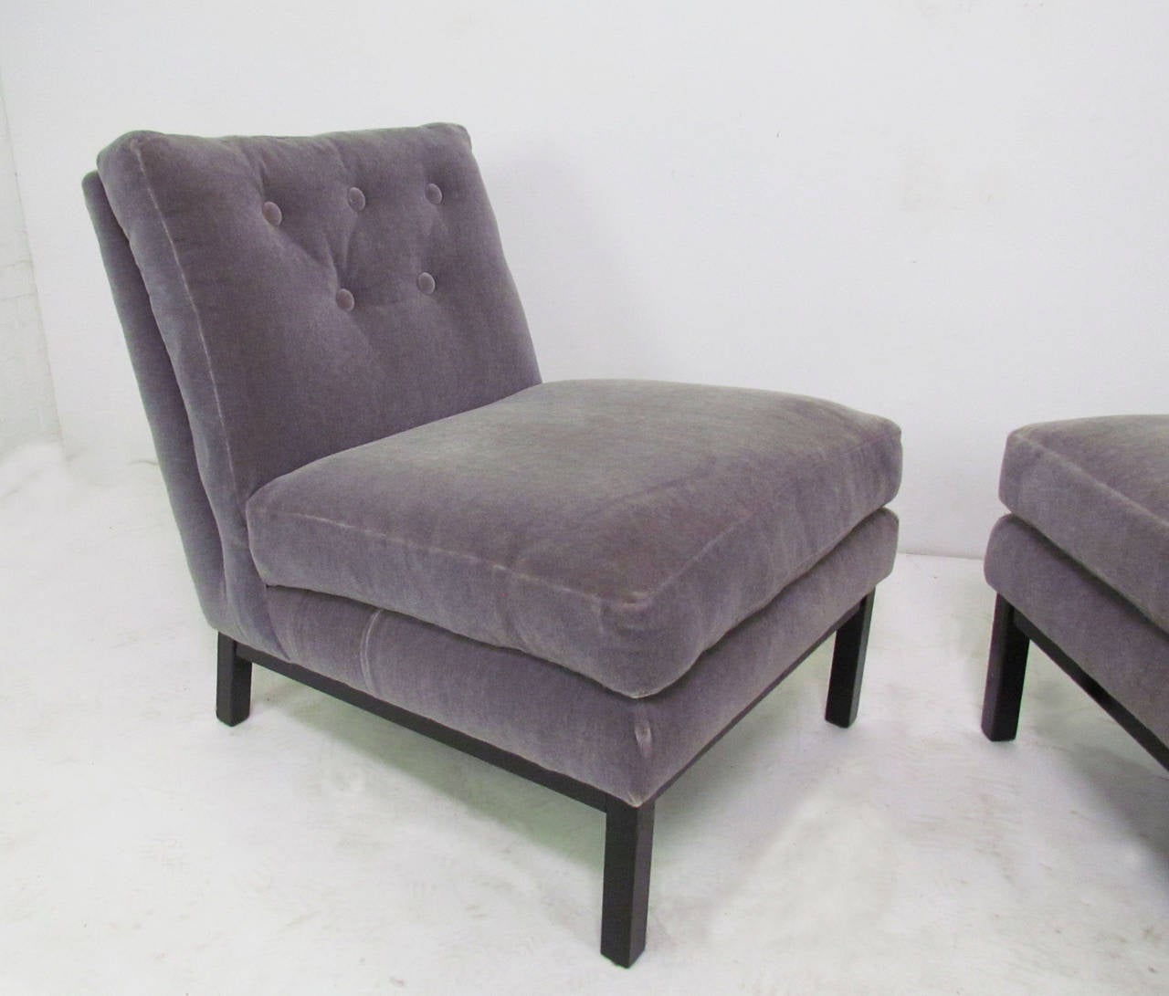 Pair of slipper lounge chairs by Harvey Probber, circa 1960s. Black lacquered wood bases, newer mohair upholstery.