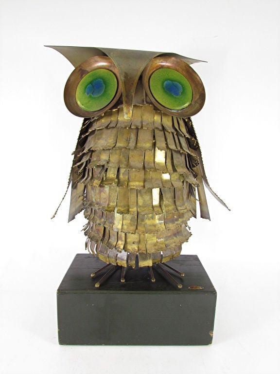 Life size sculpture of a hoot owl, with expressive enamel on copper eyes, signed C. Jere and dated 1967.  Feathered sheet brass body on wirework feet.   16 1/2