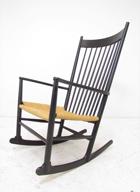 Hans Wegner “J16” rocker with corded seat for FDB Mobler, Denmark.  Created in 1944, this has been one of Wegner’s most widely recognized designs.  This vintage rocking chair marked with production date of 1972.