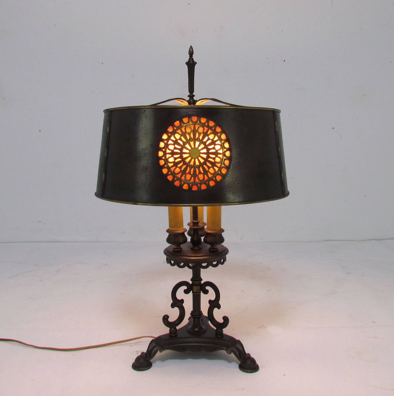 Table lamp in the Spanish Colonial Revival Style, a la Chateau Marmont.  Original shade with ornate brass medallions paneled in Mica that gives a glorious glow when lit.

Adjustable height finial, 28