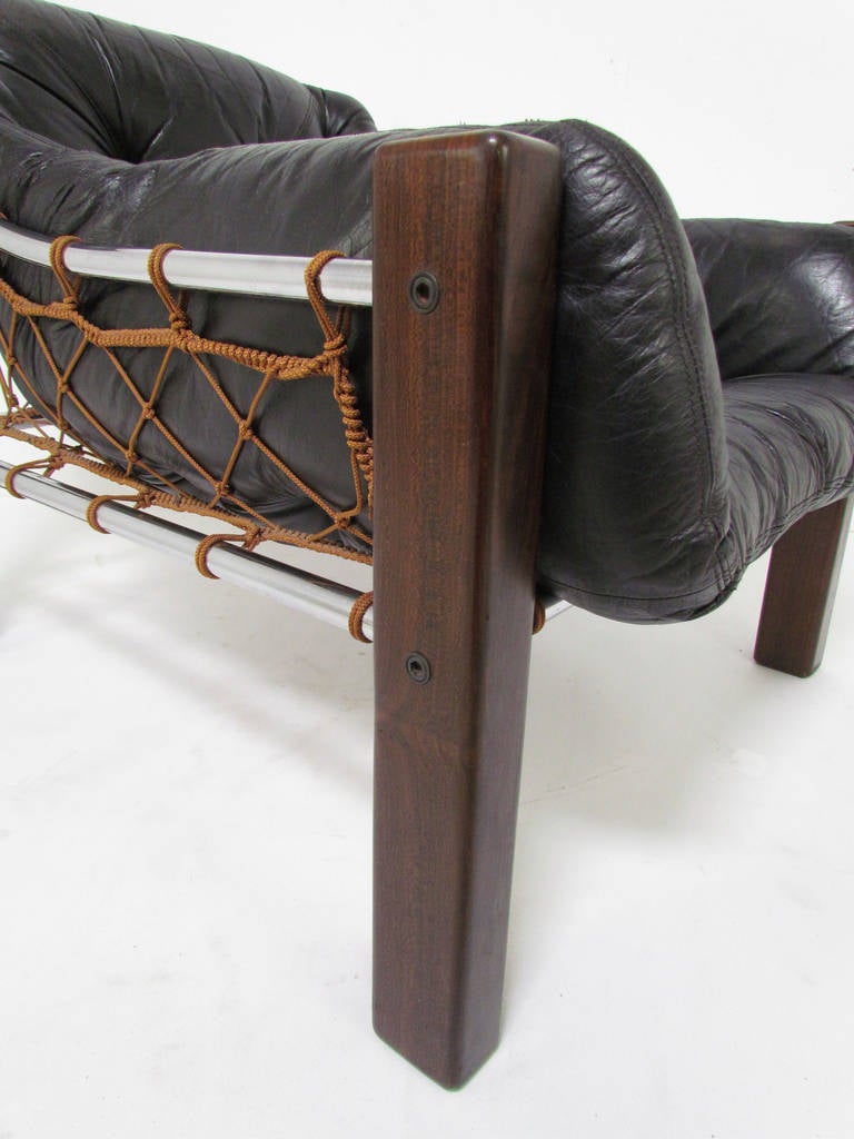 Mid-Century Modern Low Slung Lounge Chair in Leather and Brazilian Rosewood by Jean Gillon