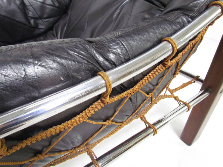 Mid-20th Century Low Slung Lounge Chair in Leather and Brazilian Rosewood by Jean Gillon