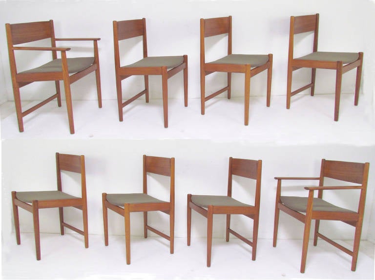 Set of eight Danish teak dining chairs by Kurt Ostervig, designed in 1961 for Sibast. Set consists of two armchairs and six side chairs.

The armchairs measure 24.25