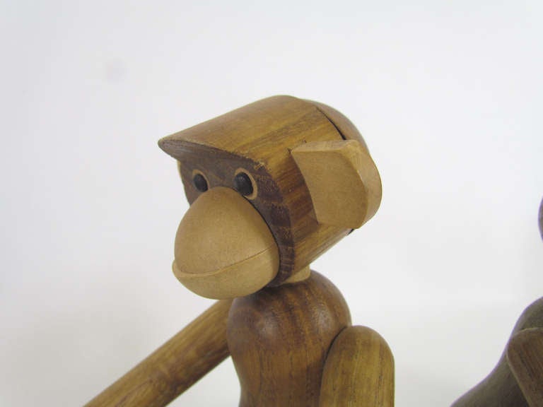 Mid-Century Modern Grouping of Teak Monkey Toys 4