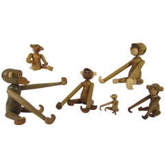 Mid-Century Modern Grouping of Teak Monkey Toys