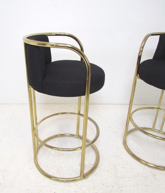 Pair of barstools in tubular brass labeled Thayer-Coggin, Highpoint N.C., and dated 1985.  Possibly a Milo Baughman design.   Seat height approximately 30.5