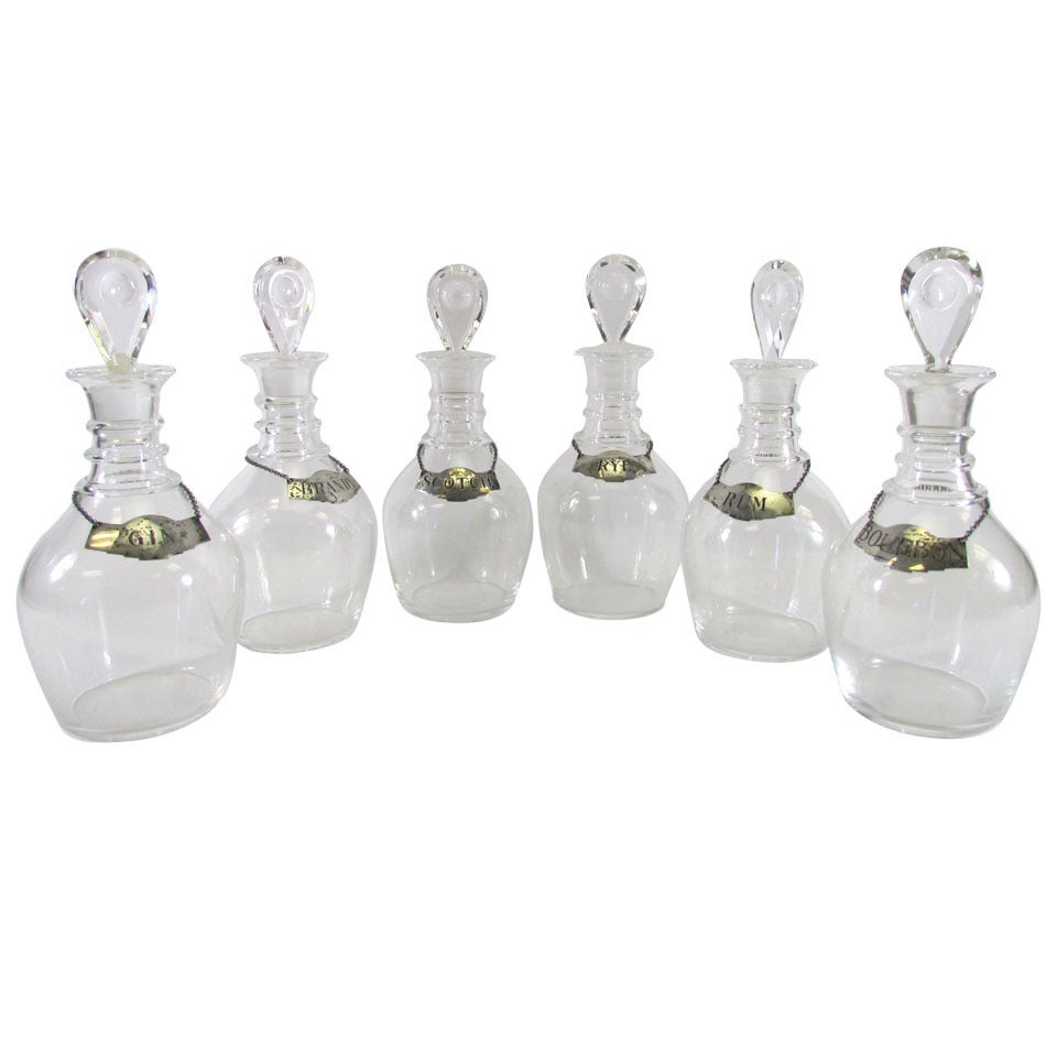 Set of Six Blown Glass Liquor Decanters by Steuben with Sterling Silver Collars