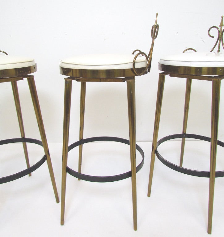 Mid-20th Century Set of Three Hollywood Regency Swivel Bar Stools ca. 1950s