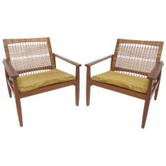 Pair of Danish Teak and Cane Lounge Chairs by Hans Olsen