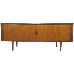 Credenza danesa con puerta de tambor de teca de S.A. Larsen para Faarup, hacia principios de los 60