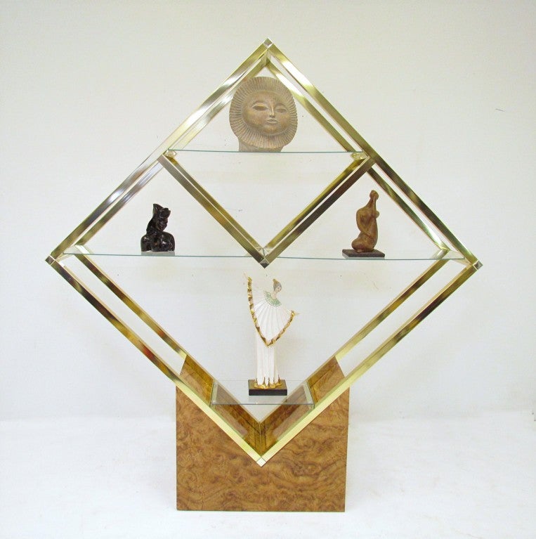 Large diamond-form display case in brass with four glass shelves, on faux burl base, ca. 1970s.  In the manner of Milo Baughman.