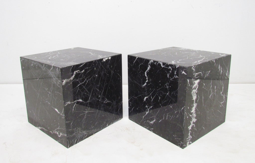 A vintage pair of minimalist side tables by Pace Furniture, ca. 1970s. Slab built with hollow interior, contrasting white and grey veining in black marble. Two pairs available, priced by the pair at $1095.