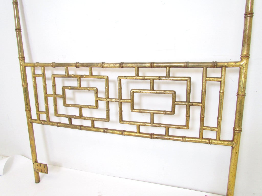 Gilded steel Chinsese Chippendale style headboard in faux bamboo, with elegant extended posts.   Designed to attach to a queen size metal bed frame, but also has adjustable slots to accommodate a double (full) bed.