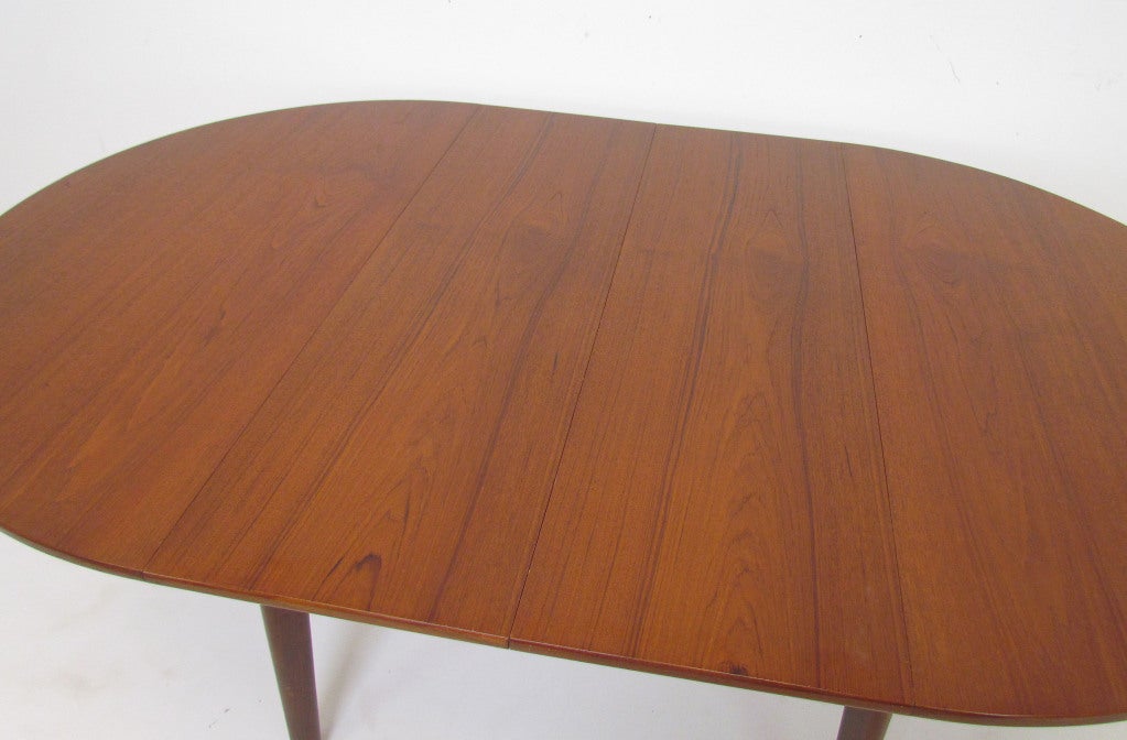 Mid-20th Century Danish Teak Round Expandable Dining Table by H.P. Hansen