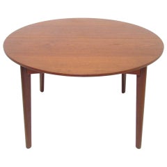 Danish Teak Round Expandable Dining Table by H.P. Hansen