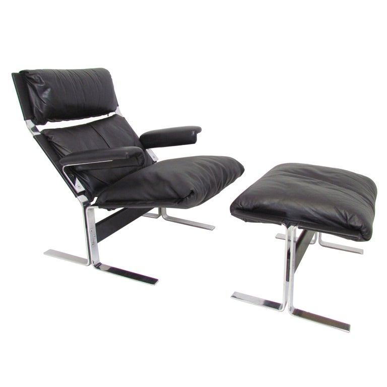 Italian Leather and Chrome Lounge Chair and Ottoman by Saporiti at 1stDibs