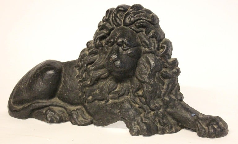 This flat-back, cast iron lion in the style of Edwin Henry Landseer, survives from the late nineteenth century. Half-model door porter lions (or door stop lions) were popular for large country houses in late Victorian times.

*Not available for