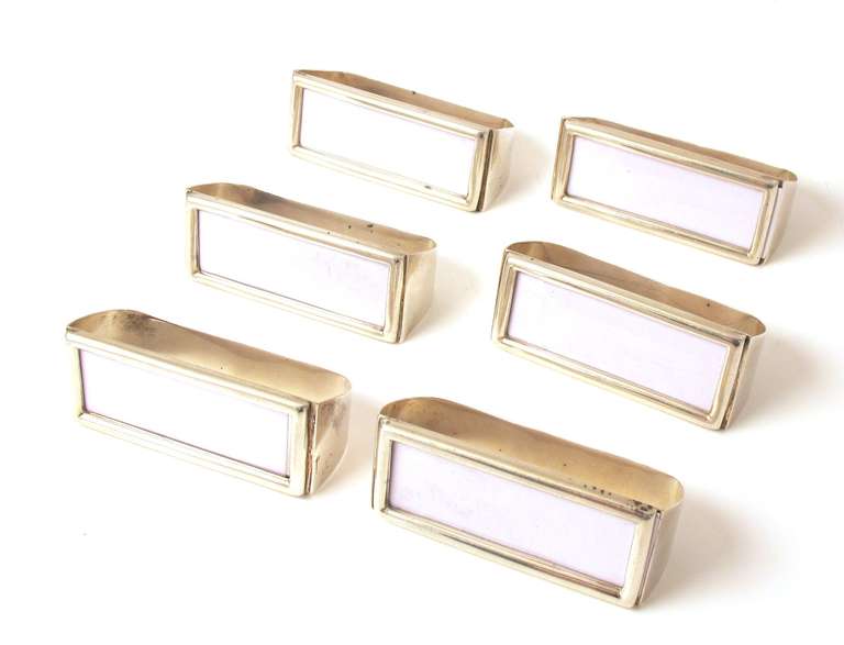 Unusual set of 6 sterling silver name plates/napkin rings, hallmarked Chester, England, 1910

*For decorative purposes only.
*Not available for sale or to ship in the state of California.