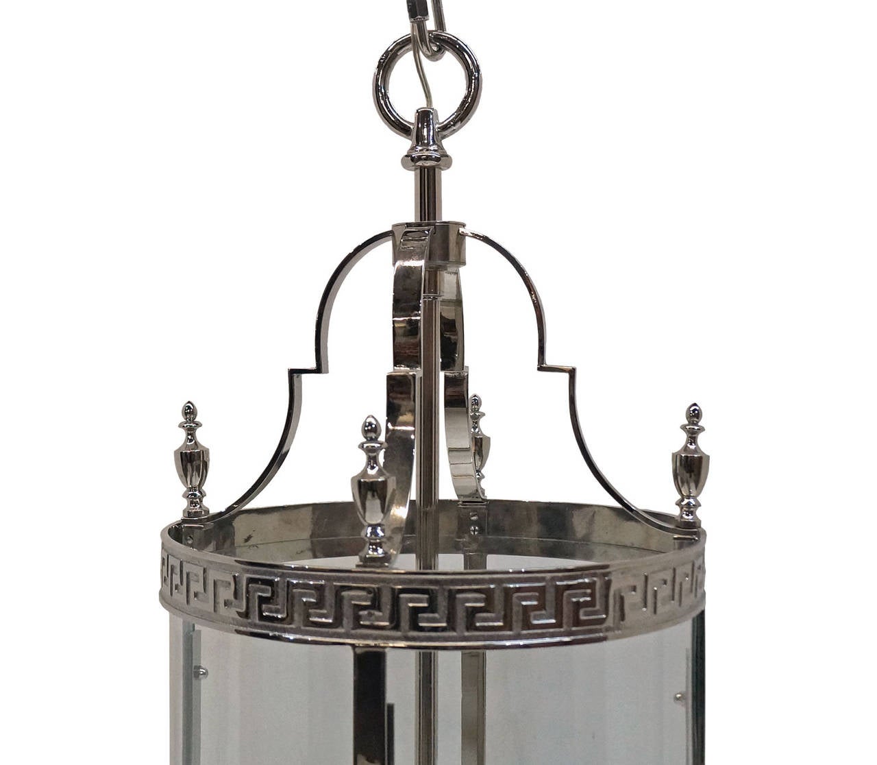 Fine neoclassical hall lantern. The cylindrical body, below four circular finials, enclosing a four branch light fitting.

Not available for sale or to ship in the state of California.