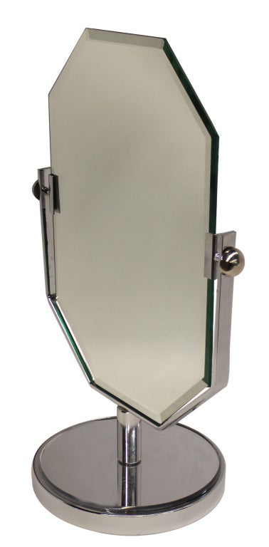 Vanity swivel mirror featuring octagonal beveled glass.

Not available for sale or to ship in the state of California.
