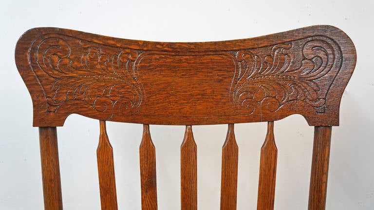 Set of three pressed back chairs in what appears to be oak. Five spindles form the back of the chair. All are solid and sturdy.

Not available for sale or to ship in the state of California.