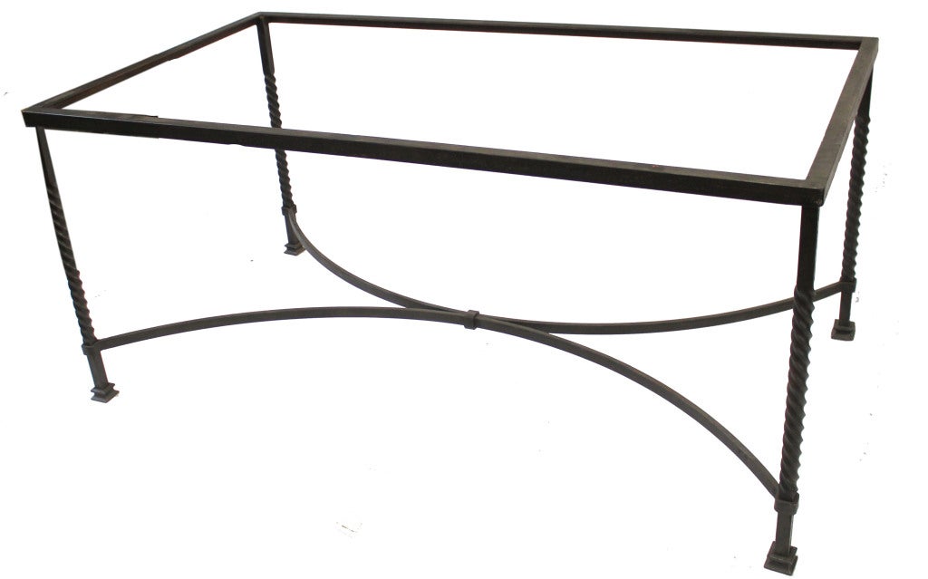 Wrought iron table base with fastened iron stretchers and rare atop twist legs.