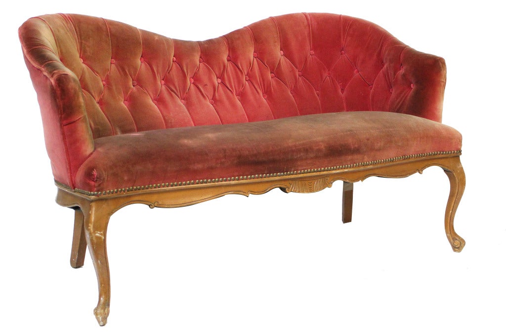 French tufted settee with nailhead trim and hand carved serpentine front on cabriole legs and toupie feet. Upholstered in red velvet.

*Not available for sale or to ship in the state of California.