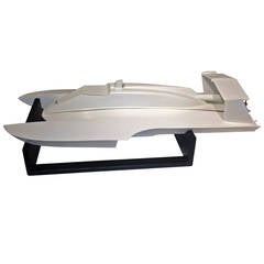 White Futuristic Gas Powered Racing Boat with Wooden Stand
