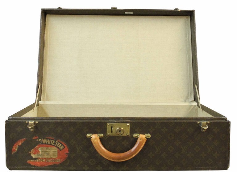 Circa 1940's Louis Vuitton suitcase with all original leather and hardware. Perfectly weathered exterior and clean white canvas interior.

*Not available for sale or to ship in the state of California.