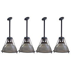 Set of Four Industrial Holophane Ribbed Pendant Lamps